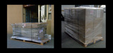 Shrinkwrapped pallets containing cardboard boxes and some other materials